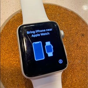 Apple watch series 2 with band and charging cord; 42mm aluminum case, gps